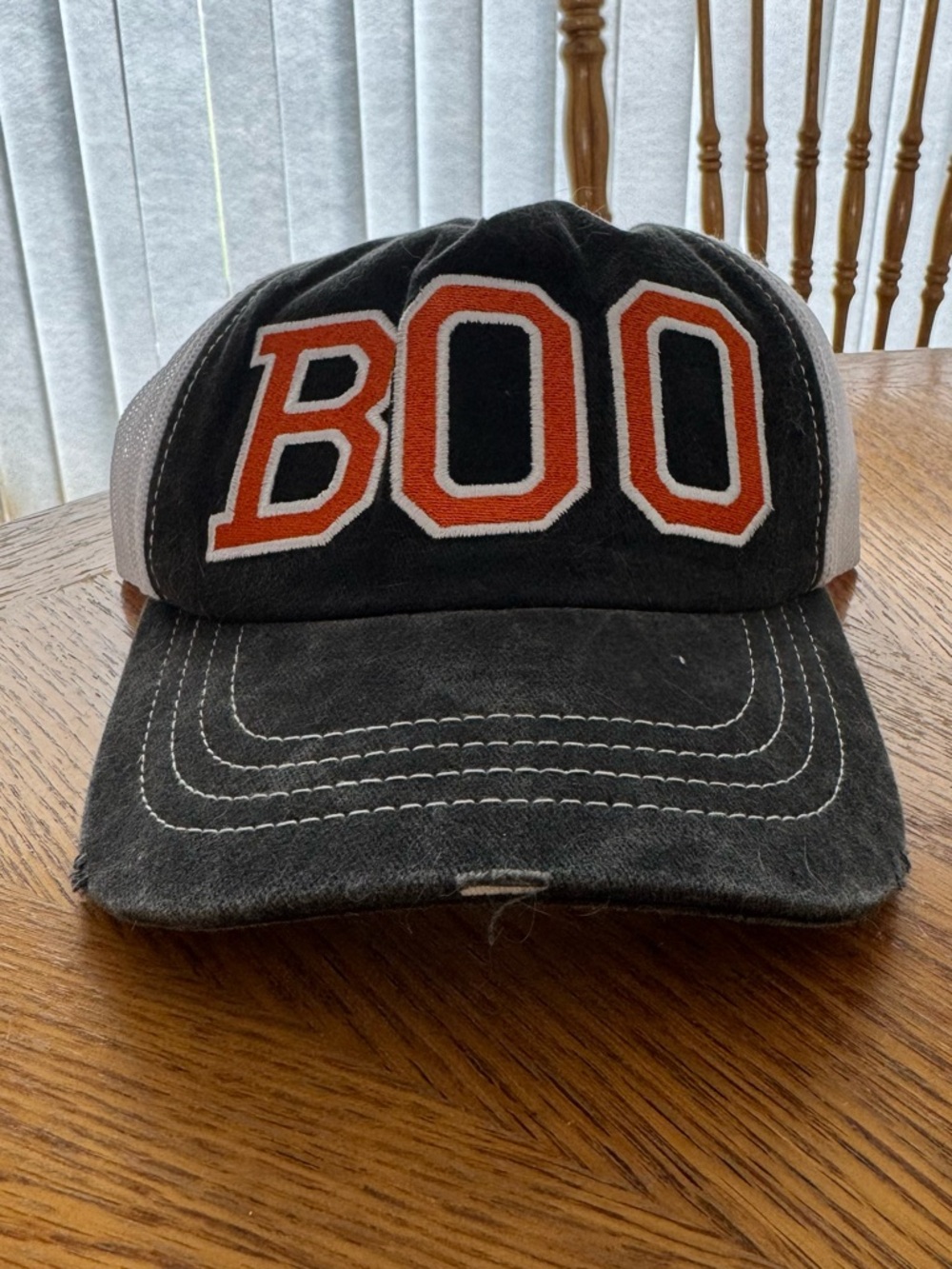 Plunder Design Black and Orange Distressed Halloween 'BOO' Women’s Trucker Hat - Picture 5 of 5
